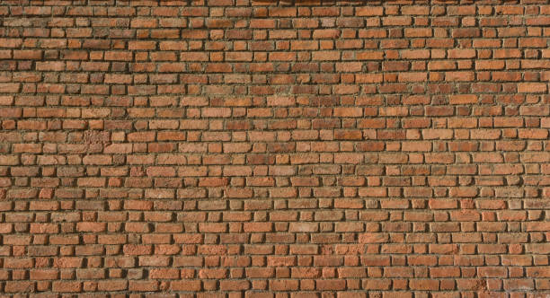 istock Wallpaper of a brick wall 1211042841