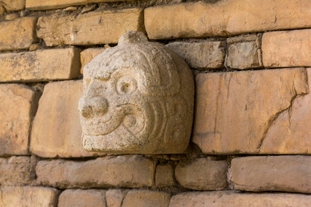 Cabeza Clava or pre-incan sculpture in Peru A Nail head (Cabeza Clava) or zoomorphic face carved in stone  from the pre-incan culture Chavin in Ancash Region, Peru huari stock pictures, royalty-free photos & images
