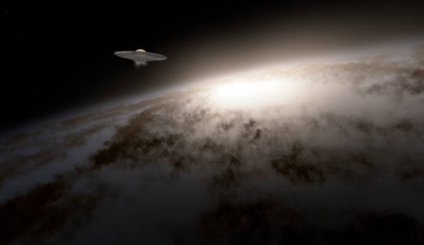 istock Digital illustration of a UFO spaceship flying above a galaxy. 1211045271