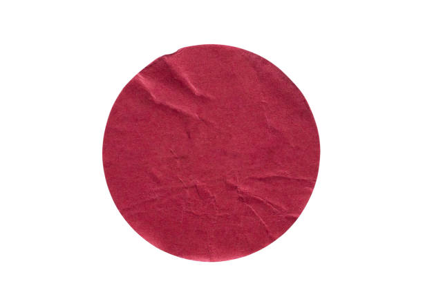 istock Blank red round adhesive paper sticker label isolated on white background 1211046142