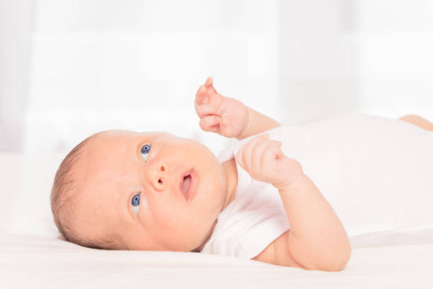 istock Newborn infant baby boy laying on the back 1211046475