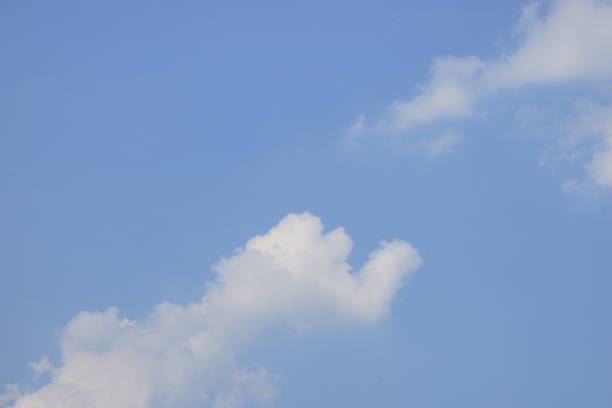 istock Closeup cumulus clouds on blue sky 1211052045