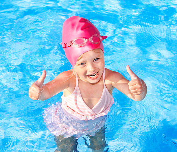 istock Child swimming in pool. 121106728