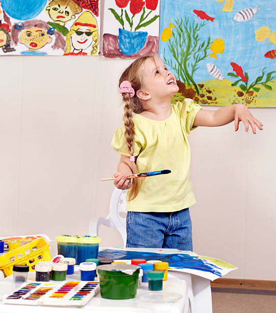 istock Child painting in preschool. 121106943