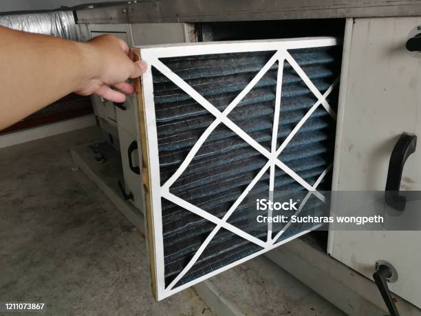 Soft Focus To Filter Of Air Handing Unit Technician Checking A Prefilter Of Air Handling Unit For Replacement A New Filter Hvac Maintenance Stock Photo - Download Image Now