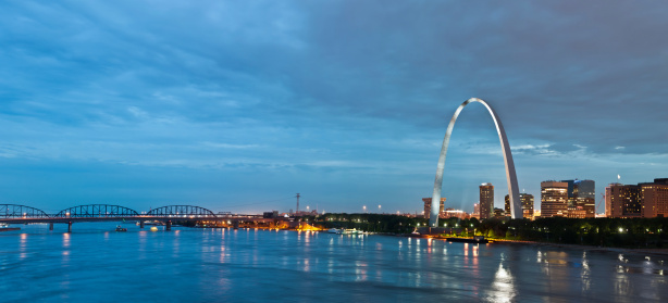 Image of St. Louis downtown with Gateway Arch at twilight. This is panoramic image- 5 vertical images stitched together in photoshop.