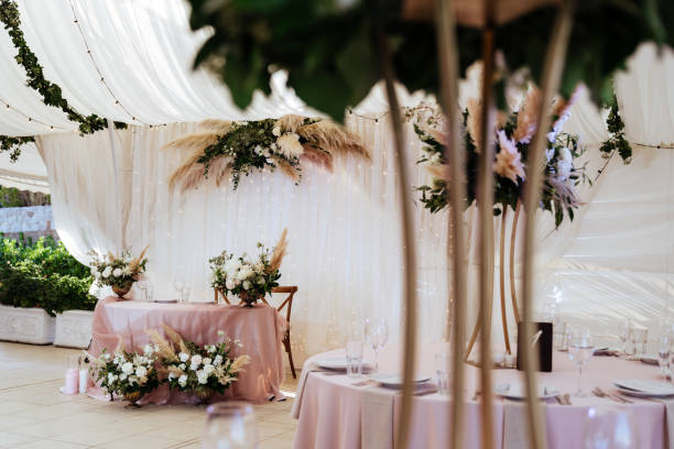 istock Wedding flowers decoration in the restaurant 1211077695