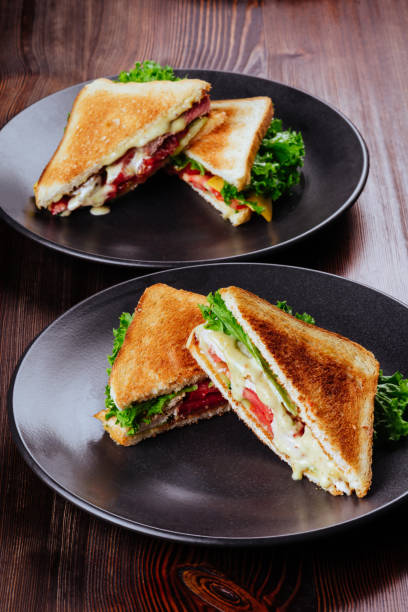 istock Sandwich bread tomato, lettuce and yellow cheese 1211077728
