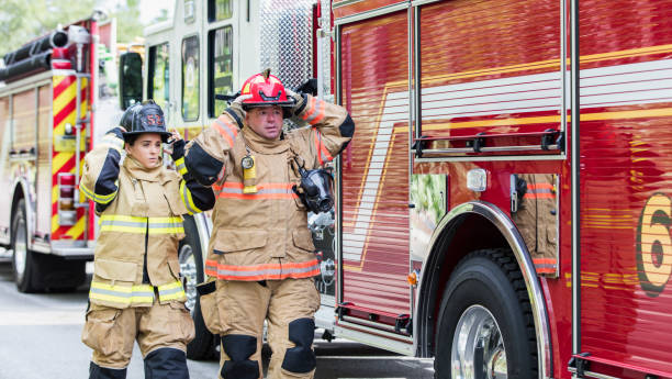 istock Firefighters in fire protection suits ready for action 1211079648