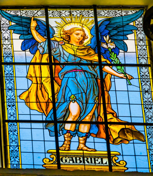 Coloful Archangel Gabriel Stained Glass Puebla Cathedral Mexico Colorful Archangel Gabriel Stained Glass Basilica Cathedral Puebla Mexico. Built in 15 to 1600s. Gabriel is Guardian Angel of Israel pics of guardian angels stock pictures, royalty-free photos & images