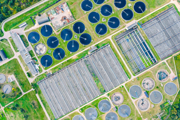 istock modern wastewater treatment plant. aerial top view 1211081551