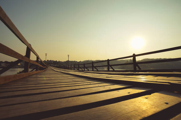 Mon Bridge or Uttamanusorn Bridge in Sangkhla Buri, Kanchanaburi Province, Thailand. This is the second longest wood bridge in the world after the Mandalay's U Bein Bridge in Myanmar.