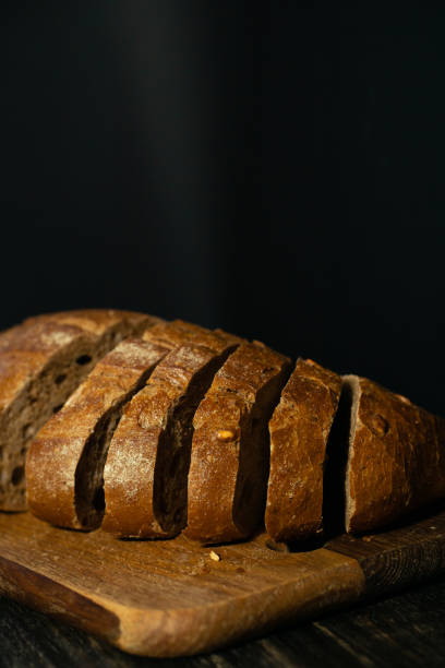 istock Rye or wheat dark bread with leaven or yeast with a golden crust 1211092926