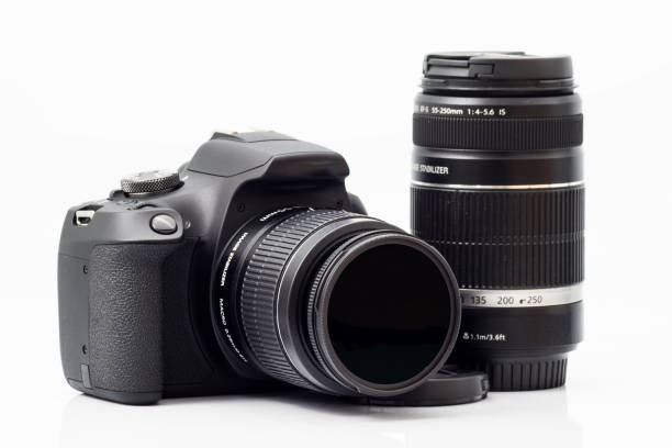istock Black DSLR camera with kit lens and zoom lens 1211095683