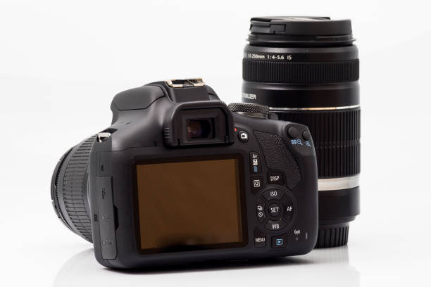 istock Black DSLR camera with kit lens and zoom lens 1211095685