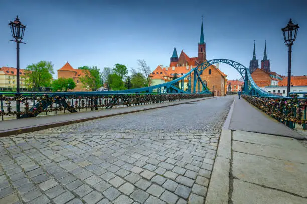 Photo of Tumski bridge over the Odra river in Wroclaw, Poland, Europe