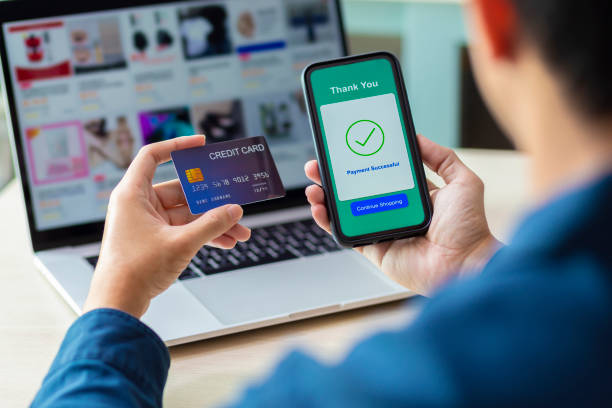 istock using smartphone and credit card online shopping 1211098914