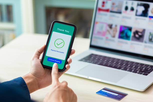 istock using smartphone and credit card online shopping 1211099024