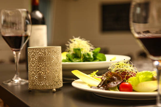 istock salad and red wine and tomato 1211107908