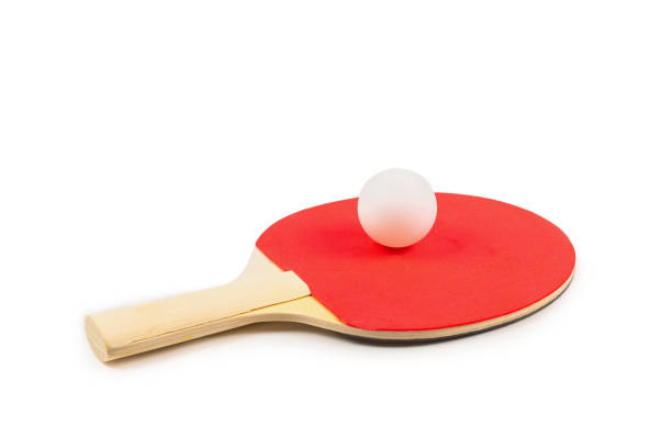 istock Pin pong on an orange background. 1211107998
