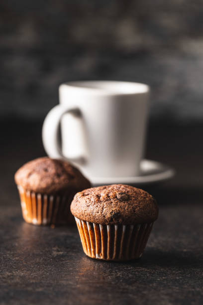 istock Tasty chocolate muffins. Sweet cupcakes. 1211108321