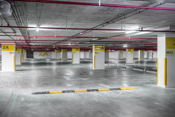 istock Empty space car parking in the building in the afternoon time 1211108950