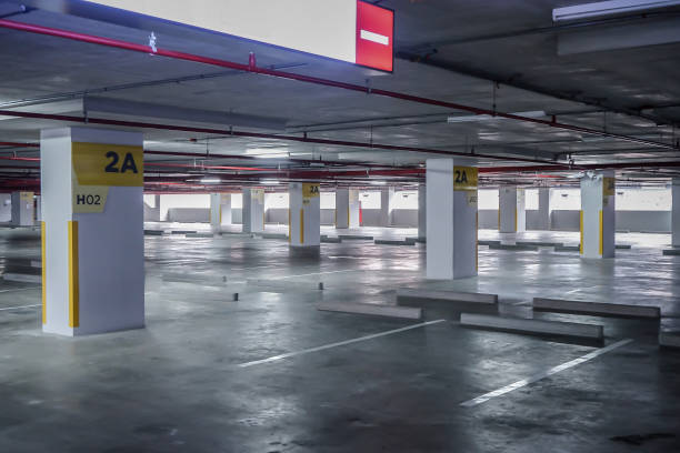 istock Empty space car parking in the building in the afternoon time 1211108975
