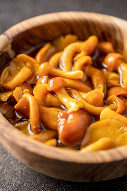 istock Pickled mushrooms. Marinated mushrooms. 1211110195