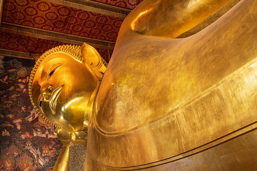 Famous tourist attraction reclining buddha in Wat Pho, Bangkok