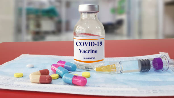 Vaccine and syringe injection. It use for prevention,immunization and treatment from corona virus infection(novel coronavirus disease 2019,COVID-19,nCoV 2019 from Wuhan). Medicine infectious  concept.