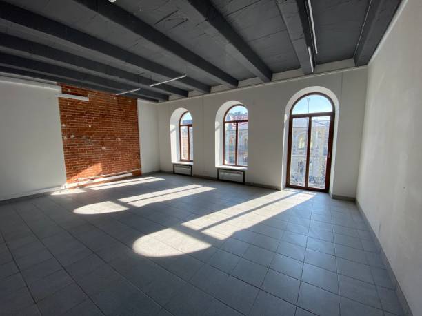 istock designer window in an empty office.  sunlight from the windows 1211115102