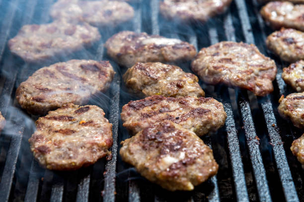 istock Meatballs cooked on Barbecue with smoke 1211117142