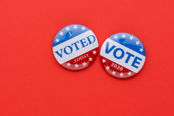 istock Vote election badge button for 2020 background, vote USA 2020 1211119347