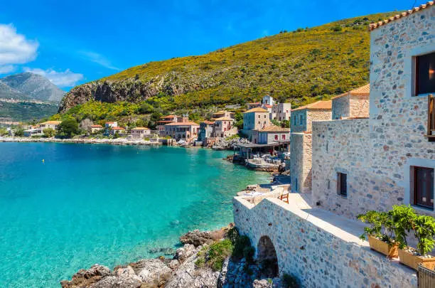 Photo of Scenic view at the picturesque village of limeni with the beautiful alleys,turquoise waters and the characteristic stone tower buildings.