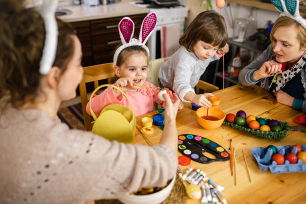 istock Playful kids, playful mothers 1211126833