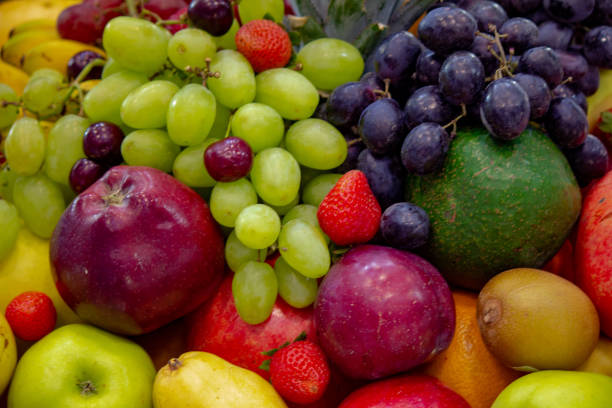 istock background: Mix of Assorted Fresh fruits in a background 1211130107
