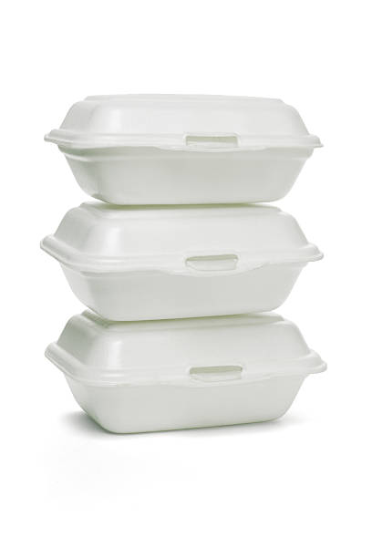 Styrofoam takeaway boxes Stack of Styrofoam takeaway boxes on white background polystyrene box stock pictures, royalty-free photos & images