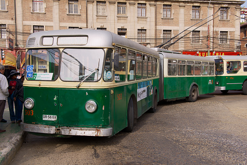Valparaiso, Chile - October 19, 2013: Vintage trolleybus at tha bus stop in Valparaiso, Chile. Old trolleybus system from 1950's  is one of the icons of Valparaiso city.