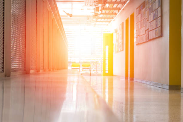 School classroom in blur background without young student; Blurry view of corridor of elementary class room no kid or teacher  in campus.