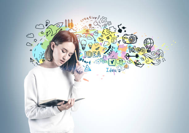 istock Woman with notebook and creativity sketch 1211144127