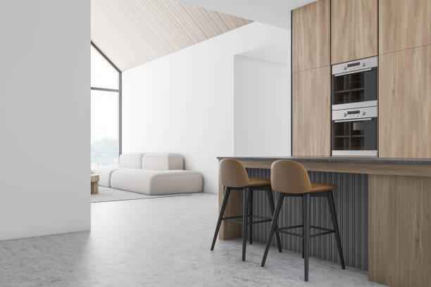 istock White kitchen with bar and living room 1211144284