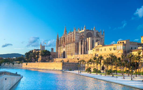 The Cathedral of Santa Maria of Palma and Parc del Mar near, Majorca, Spain The Cathedral of Santa Maria of Palma and Parc del Mar near, Majorca majorca photos stock pictures, royalty-free photos & images