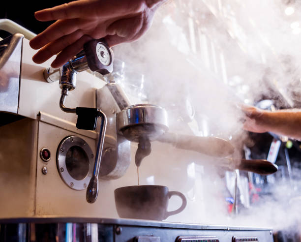 istock The bartender makes the coffee, cappuccino, cocoa, drink at the bar 1211150095