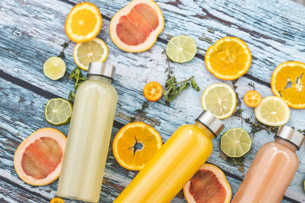 istock Orange juice and lemonade 1211151424
