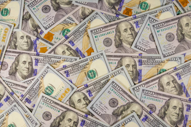 istock Background of american one hundred dollar bills 1211153129