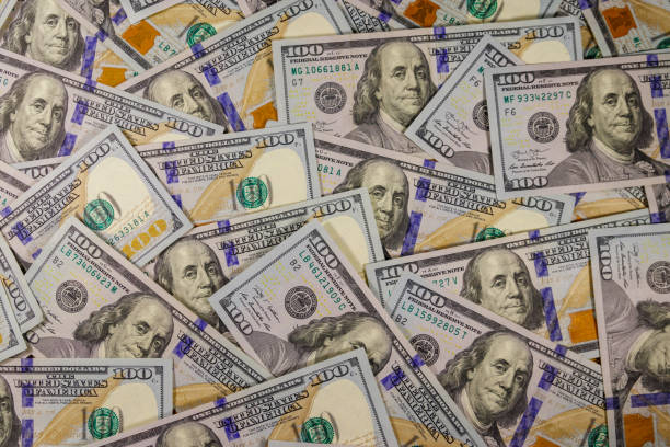 istock Background of american one hundred dollar bills 1211153131