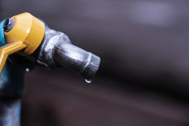 istock Water tap and water droplet 1211153496