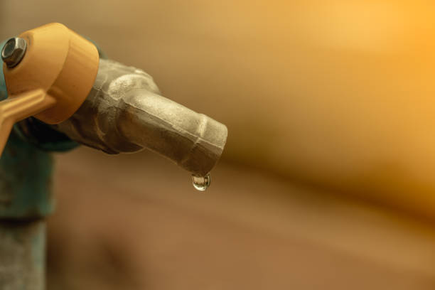 istock Water tap and water droplet 1211153501