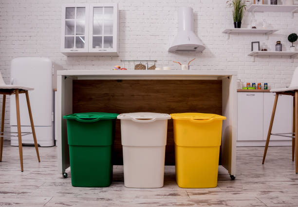 istock Recycle bins in the kitchen. Household waste sorting. 1211153505