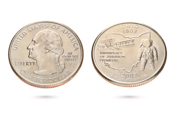 istock Twenty five US cents or quarter coin isolated on white. 1211157957